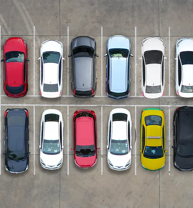 Several cars parked side by side