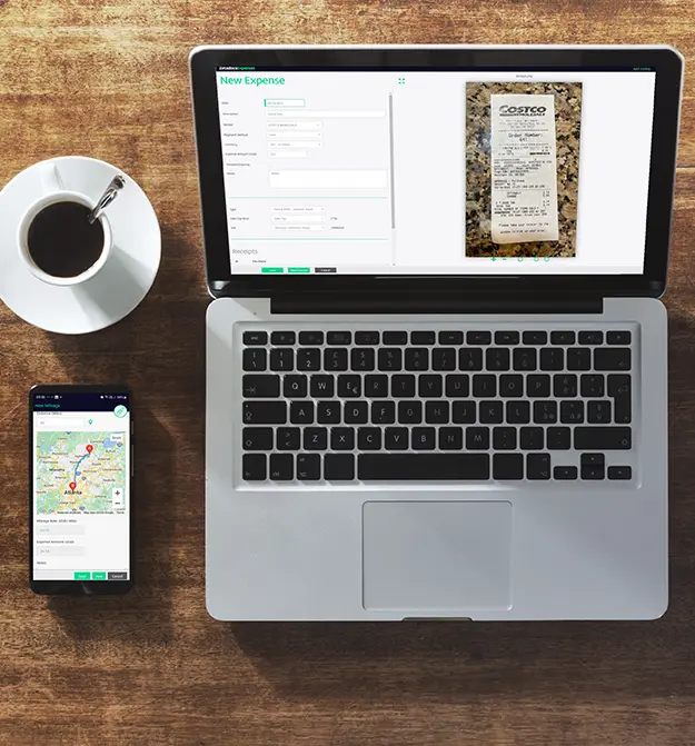 Laptop with Zetadocs Expenses on screen and a phone next to it with the Zetadocs Expenses app open, which is next to cup of coffee