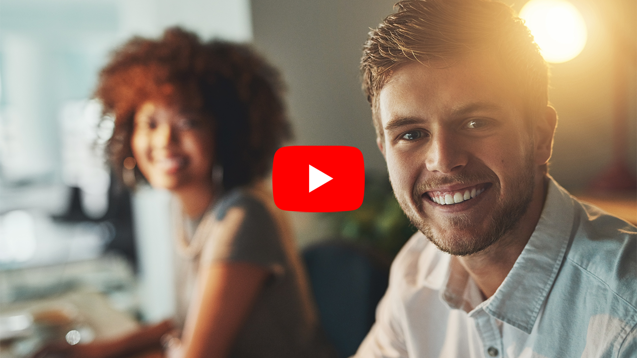man smiling at camera for Timemaster demo video