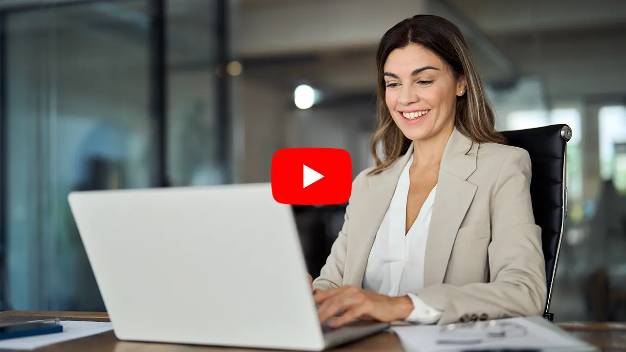 lady using laptop as a thumbnail for Zetadocs journal document processing demo video
